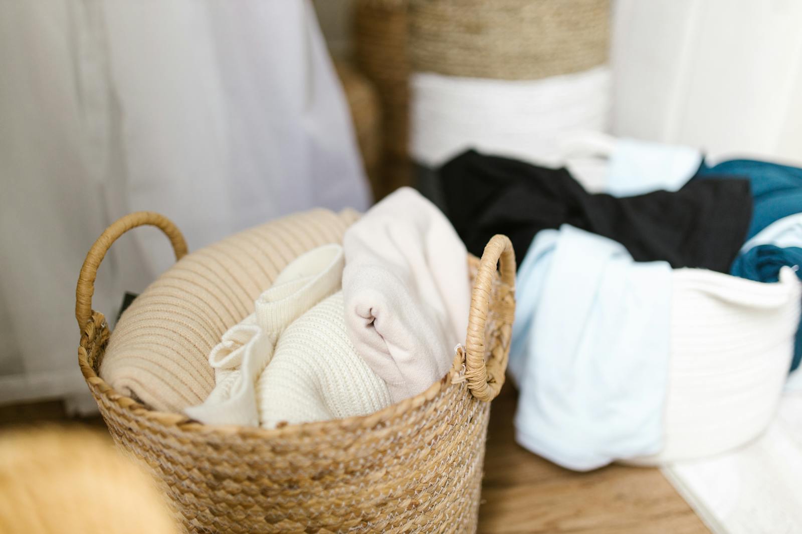 Laundry basket with folded household textiles